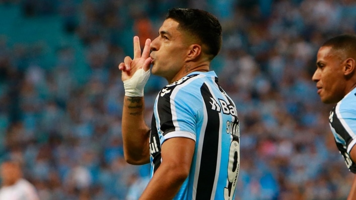 Suarez hits first-half hat-trick in debut Gremio win