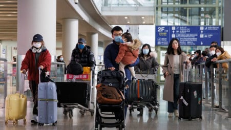 China suspends travel visas for South Korea and Japan due to COVID restrictions