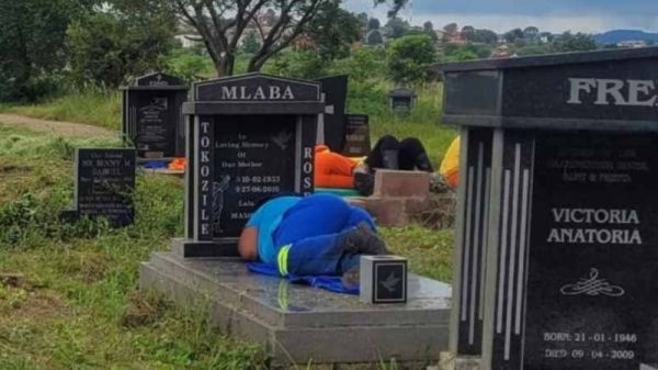 South Africans face charges for sleeping on graves