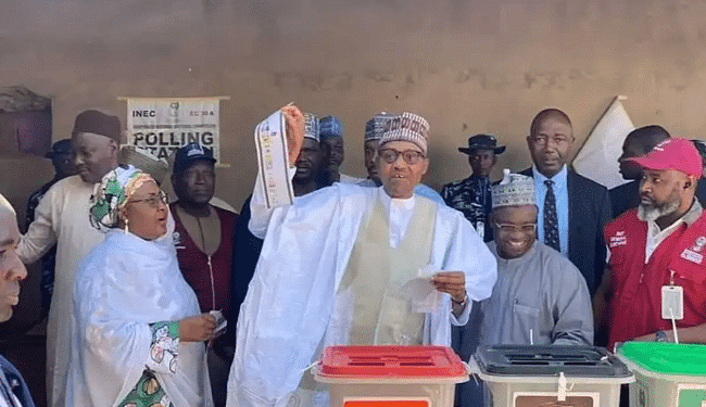 Nigeria election 2023: Buhari displays ballot paper after voting in Katsina with his wife