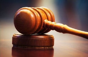 Court issues bench warrant for arrest of economist