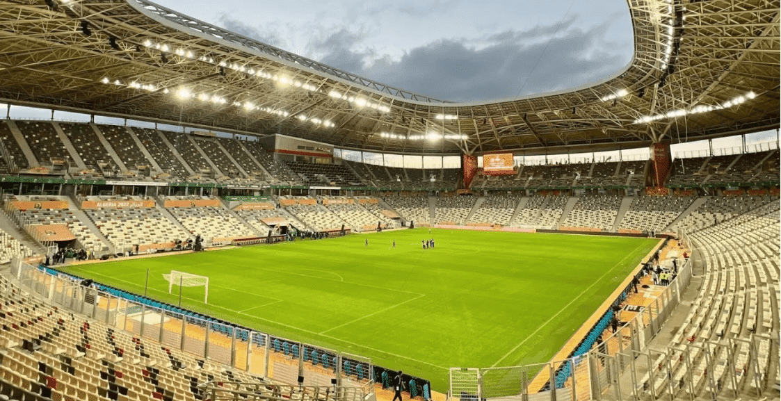 What draws the Nelson Mandela Stadium to Algeria?