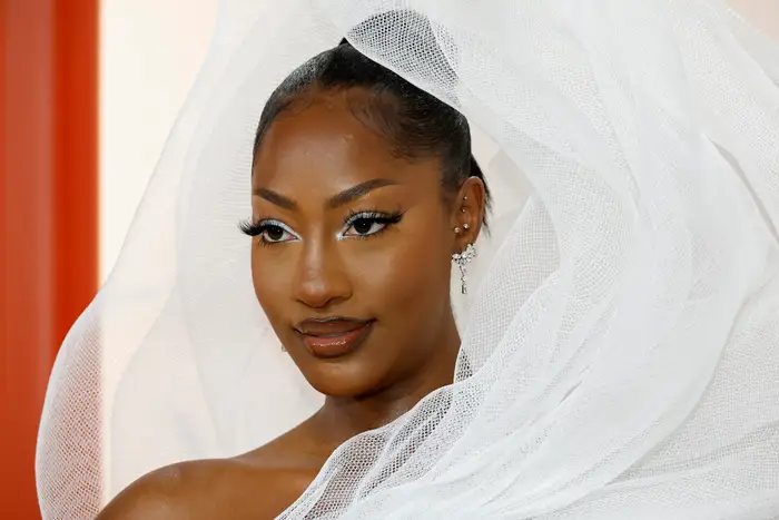 Tems explains ‘view-blocking’ white gown at the 2023 Oscars