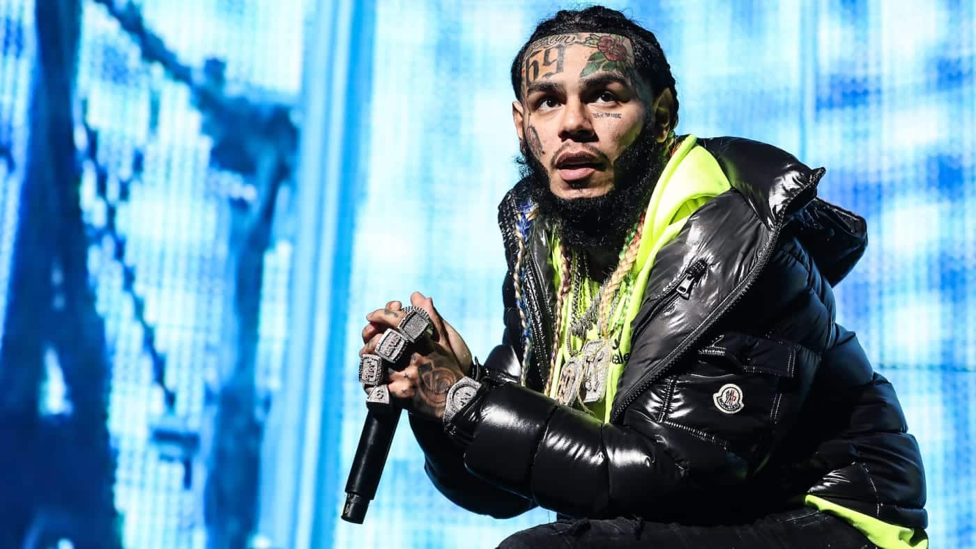 6ix9ine’s bodyguard dares attackers to fight him for $10k or “die”