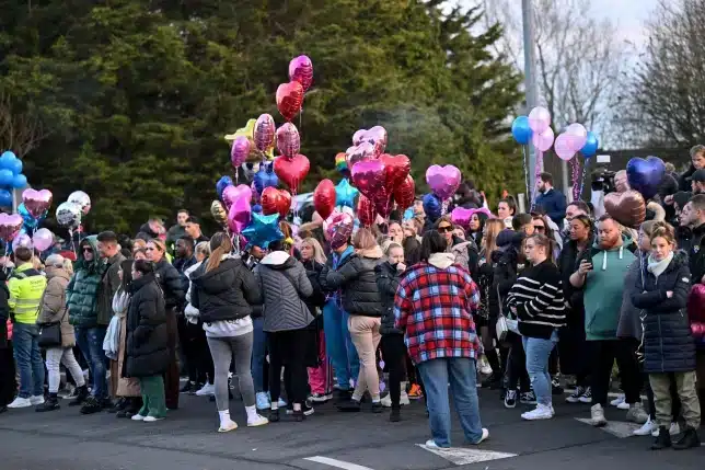 Hundreds gather at vigil pay respect to friends murdered in Cardiff