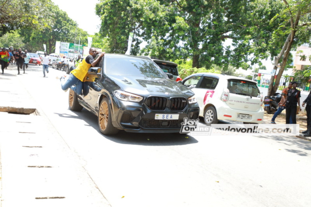 Fan jumps on Adebayor’s car to see star after Atsu’s burial