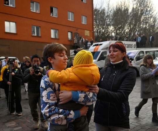 Ukrainian children kidnapped by Russia finally embrace their family as they return