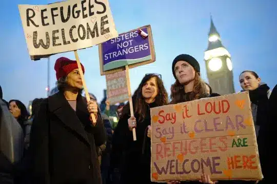 Hundreds of demonstrators march to Westminster to oppose the bill on illegal immigration