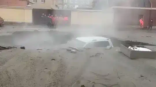 Family vehicle sucks into a sinkhole filled with boiling water
