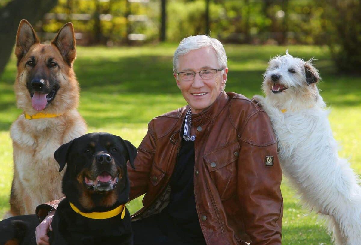 Stars, fans and dogs gather to bid  Paul O’Grady farewell at funeral