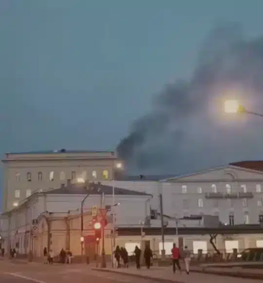 Fire engulfs a Russian defense facility as Putin meets “yards away.”