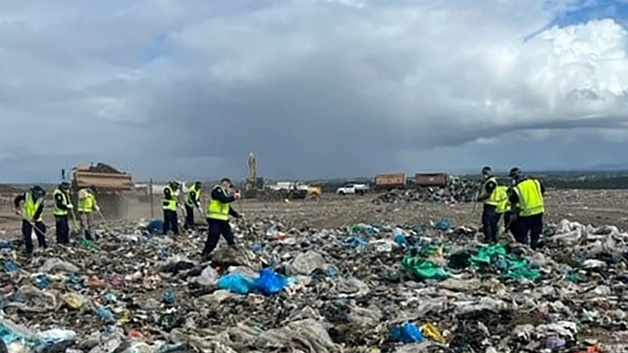 Police in Australia search through 3,000 tons of trash for the remains of a missing lady
