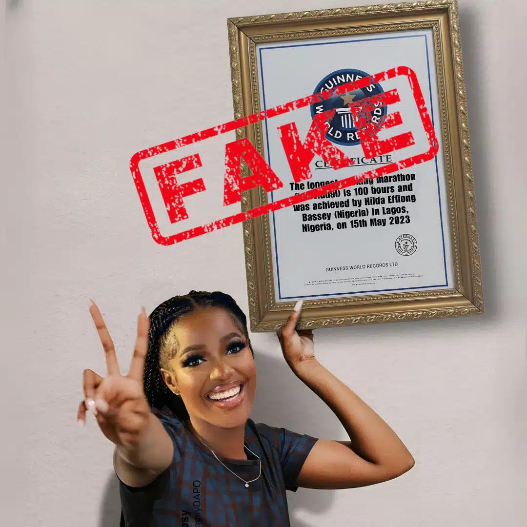 Photo of Hilda Baci holding a certificate from the Guinness World Records is doctored