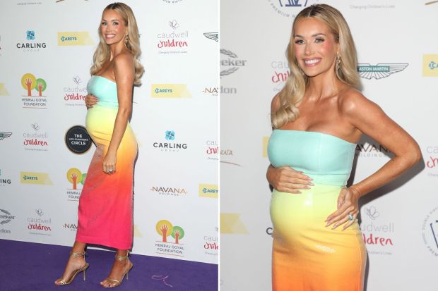 Laura Anderson shows off her baby bump on the red carpet