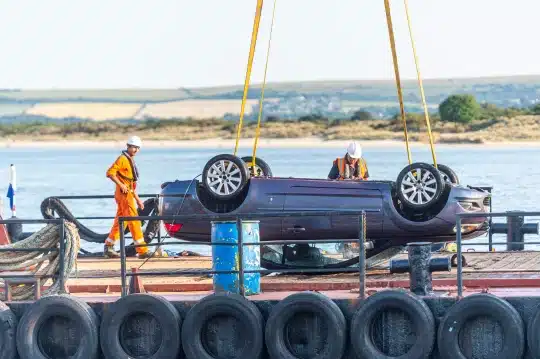 Woman’s car rolls into the sea after stopping to buy ice cream
