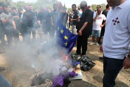 Tbilisi Pride terminated as protestors invaded the event and burnt flags