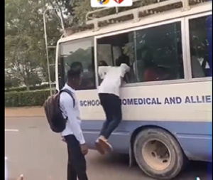 Video: UG students jump through shuttle windshield windows in battle for seats
