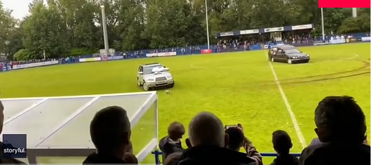 Four men detained after hearse driven onto football field during game