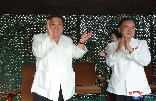 Kim Jong-un applauds his current ballistic missile launch