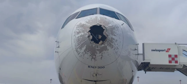 Plane damaged by freak hailstorm forced to make emergency landing