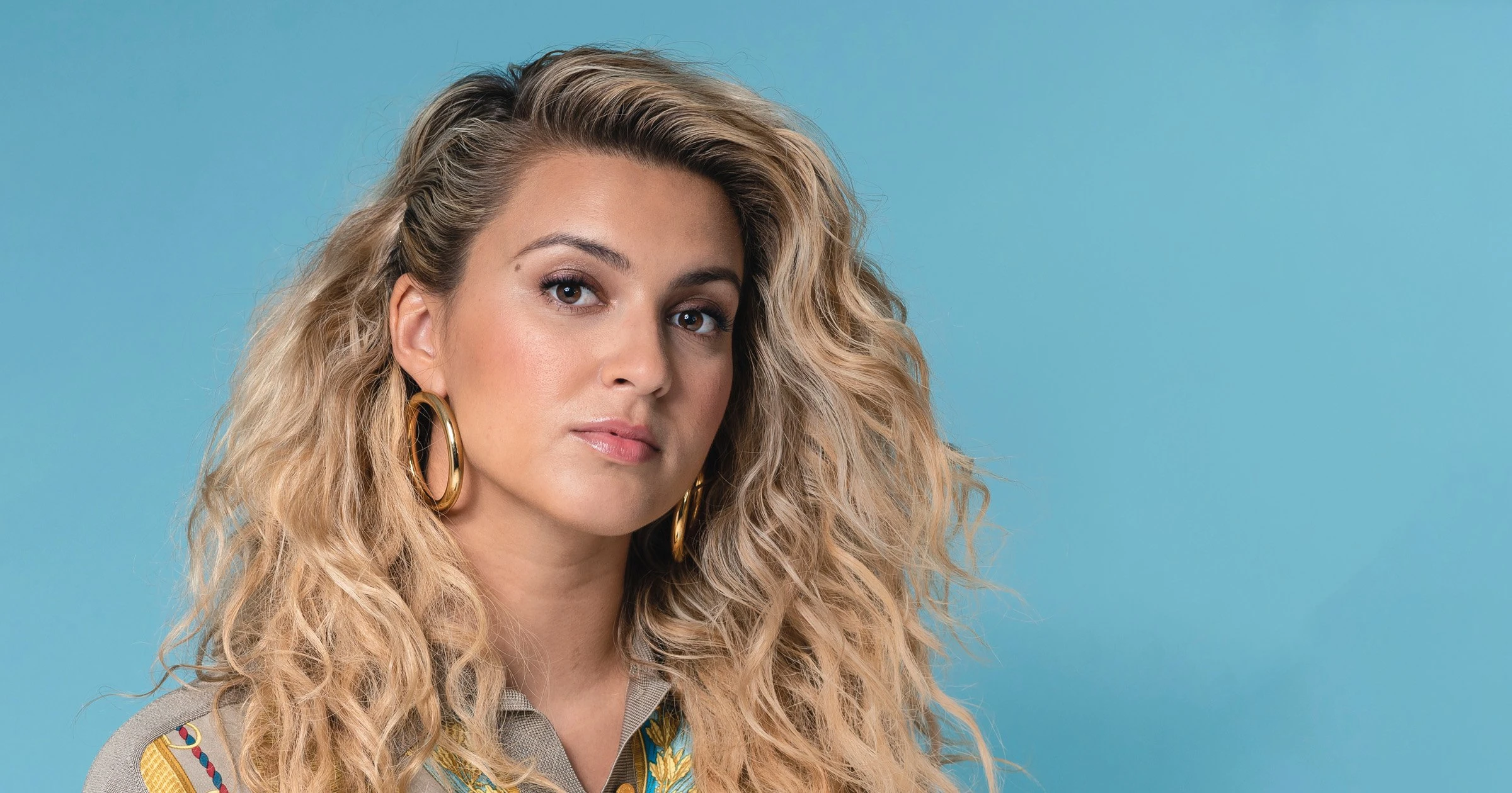 Tori Kelly hospitalized after collapsing at a restaurant