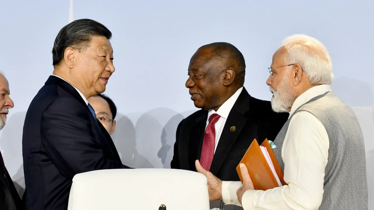 Modi and Xi Jinping meet to ‘intensify efforts’ to defuse border dispute