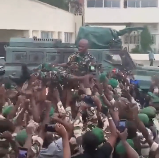 Gabon military officers celebrate successful overthrow of President Ali Bongo