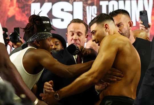 John Fury smashes table in tense news conference with KSI