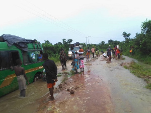 Passengers stranded in Oti Region after heavy rains render road impassable
