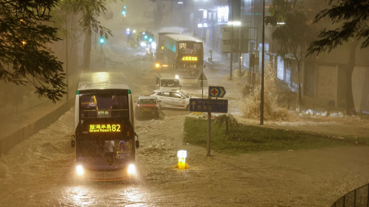 Flash flooding shuts down city of Hong Kong following heaviest downpour
