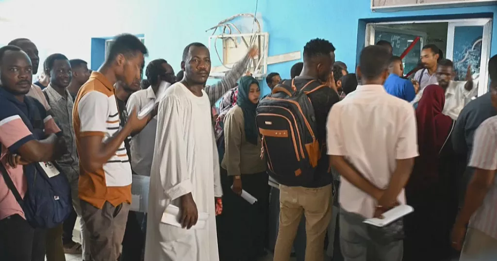 Distressed Sudanese endure unending wait for passports to flee war