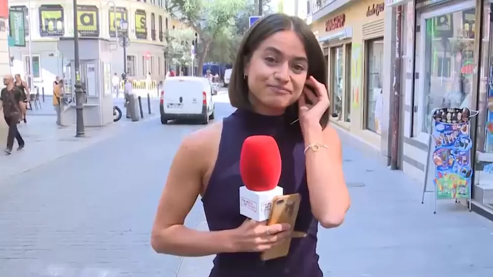 Man detained after groping Spanish reporter live on television