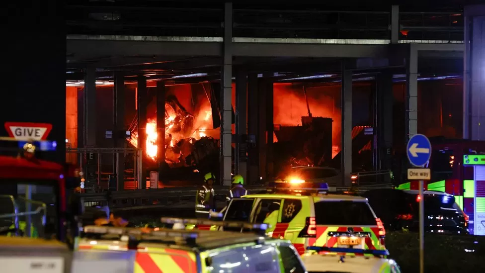 Fire smashes through multi-story car park at Luton Airport