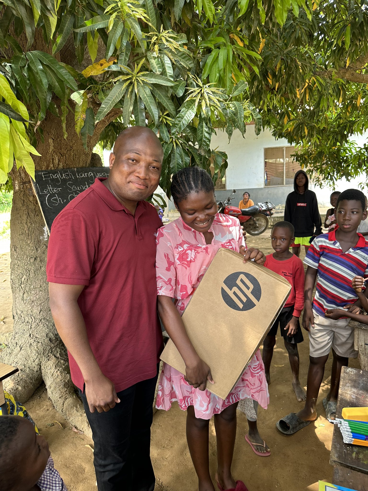 Lady offering free classes for Akosombo dam spillage student victims receives scholarship, laptop