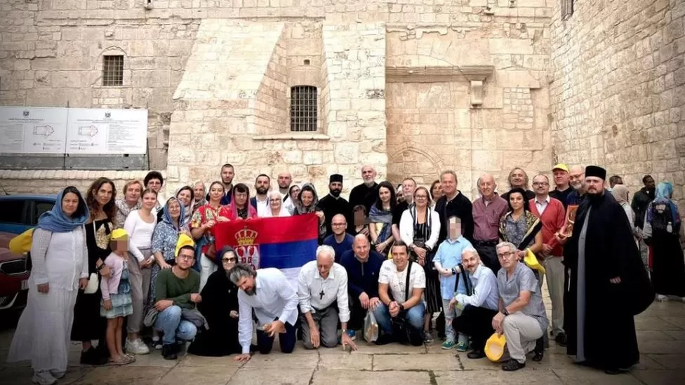 Church group seeks shelter inside hotel as bombs heard