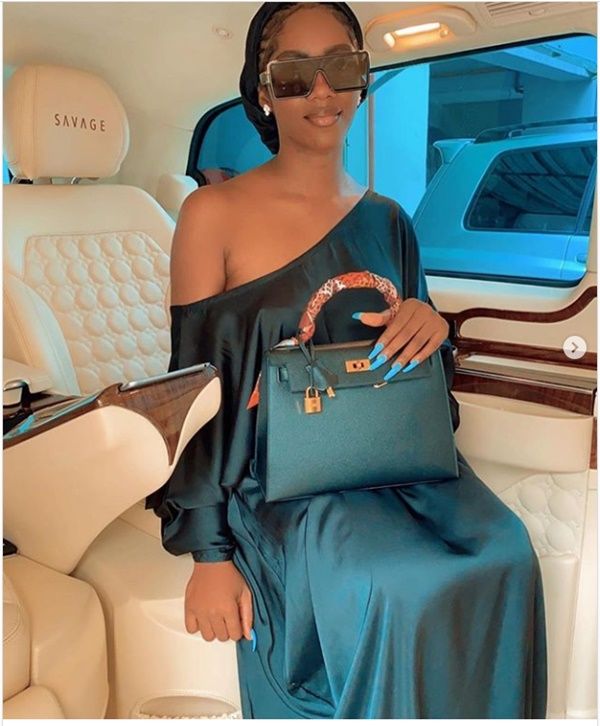 Tiwa Savage shows of newly acquired Range Rover