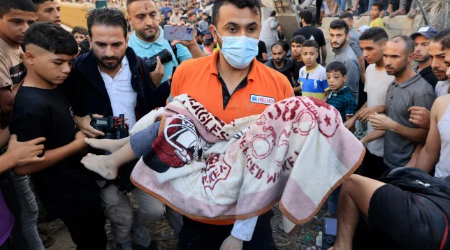 Gaza school bombing by Israel leaves women and children ‘torn to pieces’