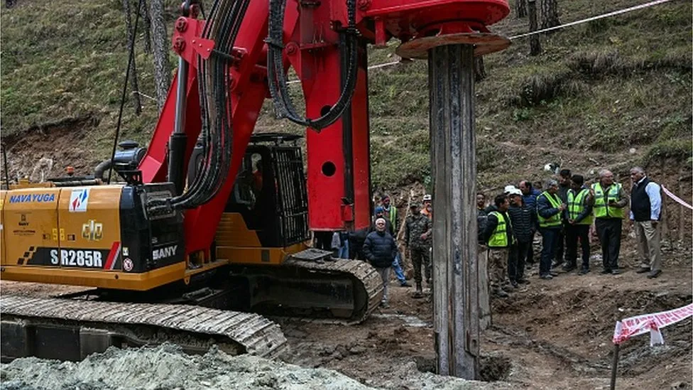 Rescuers investigate fresh approaches to free stranded Indians