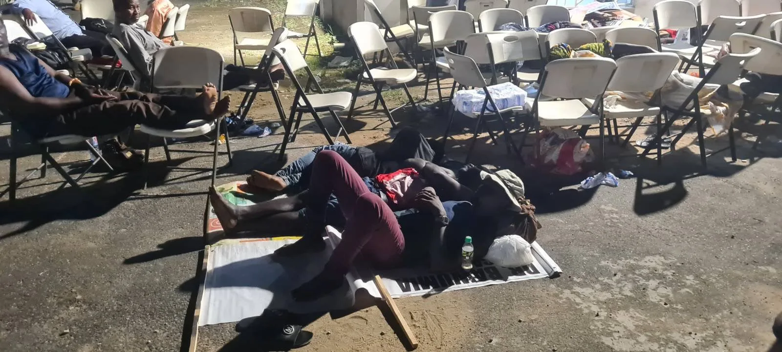 Defunct Gold Coast security customers sleep on plastic chairs, mattresses at Finance Ministry over unreleased funds