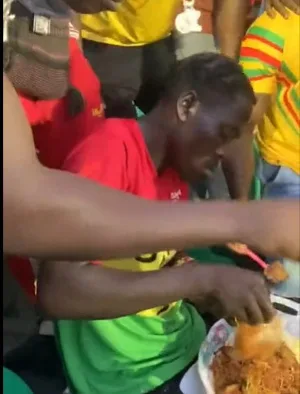 ‘Gobe reigns’ – See how Ghanaian football supporters jubilated at the sight of gari and beans at stadium during Ghana- Madagascar game