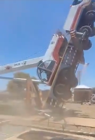 Workers escape fatal accident as crane lifting heavy transformer topples