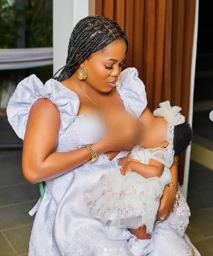 Netizens reacts to Mzbel’s photo breastfeeding her daughter