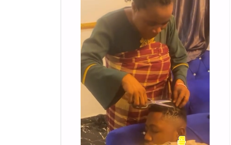 Nigerian mother creates stir online by cutting son’s dreadlocks while he sleeps