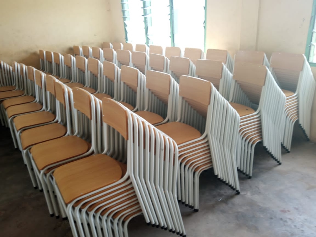 Ministry of Education donates 400 chairs and tables to Asuom Senior High