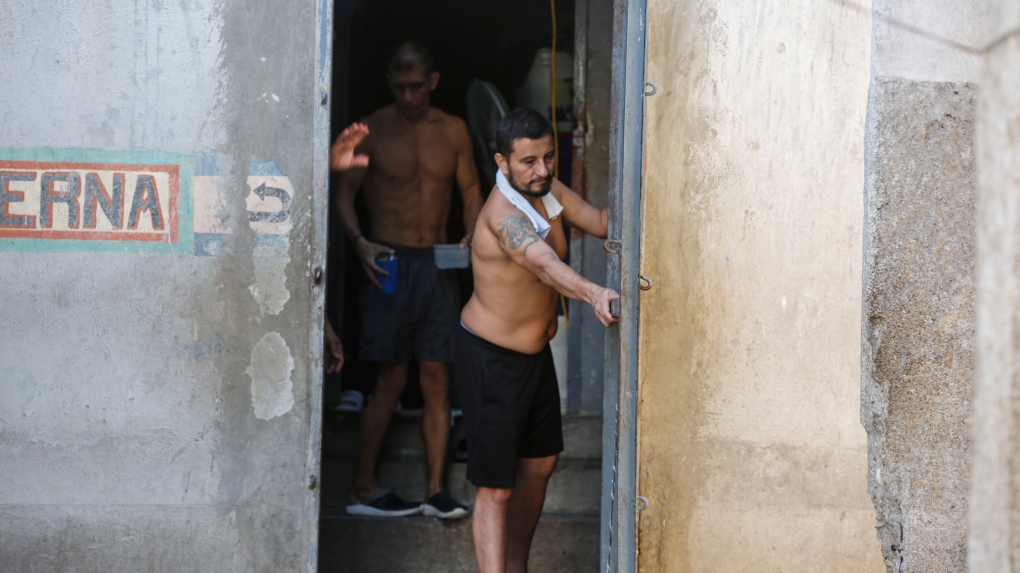 Gangs raid Haiti’s biggest jail, forcing hundreds of convicts to escape