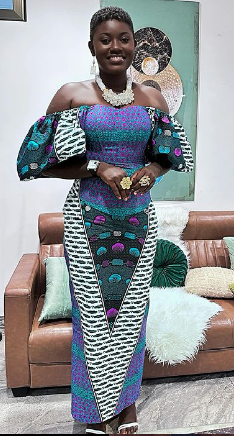 GWR Afua Asantewaa slays in corseted African print gown and curly short hair