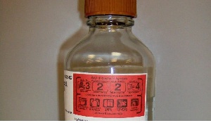 Father on the run after pouring acid on wife, child