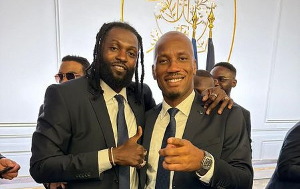 Humble beginnings: Adebayor celebrates invitation to French presidency by Emmanuel Macron