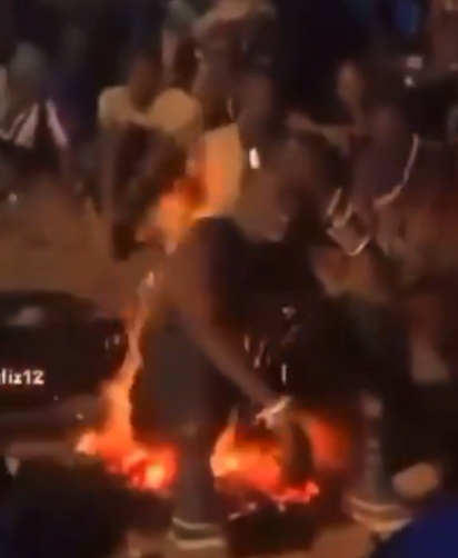 Man defies logic by sitting, rolling in fire without getting burnt