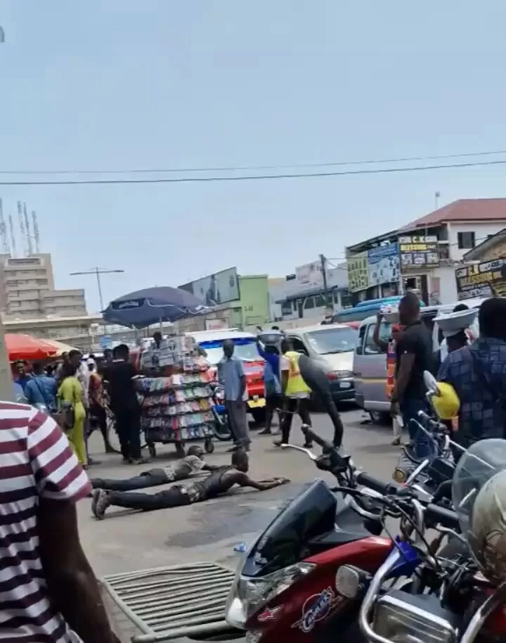 iPhone thieves forced to roll on the ground by military officer at Kwame Nkrumah Circle